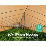 3.66m wide sandstone 50 percent shade cloth installed over raised garden beds and greenhouse framework protecting fruiting vegetables
