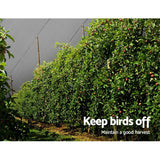 Image demonstrating 1.83m x 30m wide 50 percent white shade cloth used for protecting fruit trees from birds, fruit bats and hailstones