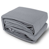 Folded 5m x 6m grey rectangle shade sail out of package ready for installation
