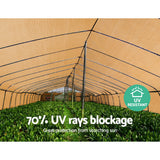3.66m wide sandstone 70 percent shade cloth installed over a large nursery shade house protecting plants