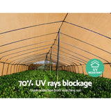 3.66m wide beige 70 percent shade cloth installed over a large nursery shade house protecting orchids and ferns