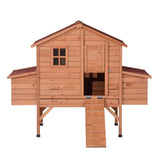 Front view of XXL wooden chicken coop with green asphalt roof and galvanised mesh wire