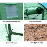 Green insect screen with built-in windows, roll-up doors, straps, and ground pegs.