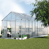 Large 6.03x2.44m aluminium greenhouse with twin-wall polycarbonate panels in an Australian backyard