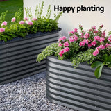 Corrugated raised beds set of 2 in an oval design set up in backyard