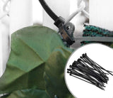 Close-up of a Fake ivy hedging roll with a black cable tie and an inset showing more black cable ties.