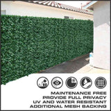 Fake ivy hedging roll attached to a suburban backyard timber fence with zip ties.