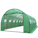 Open roll-up front door and mesh side ventilation windows on tunnel hot house