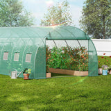 Large walk-in tunnel greenhouse for sale in Australia with galvanized steel frame set up in a backyard.