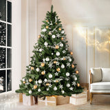 Jingle Jollys 2.7m green artificial Christmas tree with 1590 tips on a metal stand.