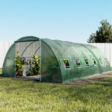 Large 6x4m tunnel greenhouse with galvanised steel frame set up in a backyard