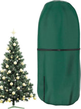 Heavy duty green upright Christmas tree storage bag fitted over a tall 9ft artificial tree in a garage